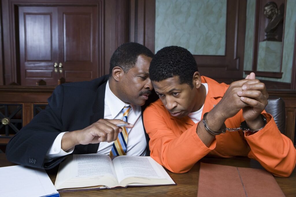 Defendant consults his criminal defense lawyer in Dayton, Ohio