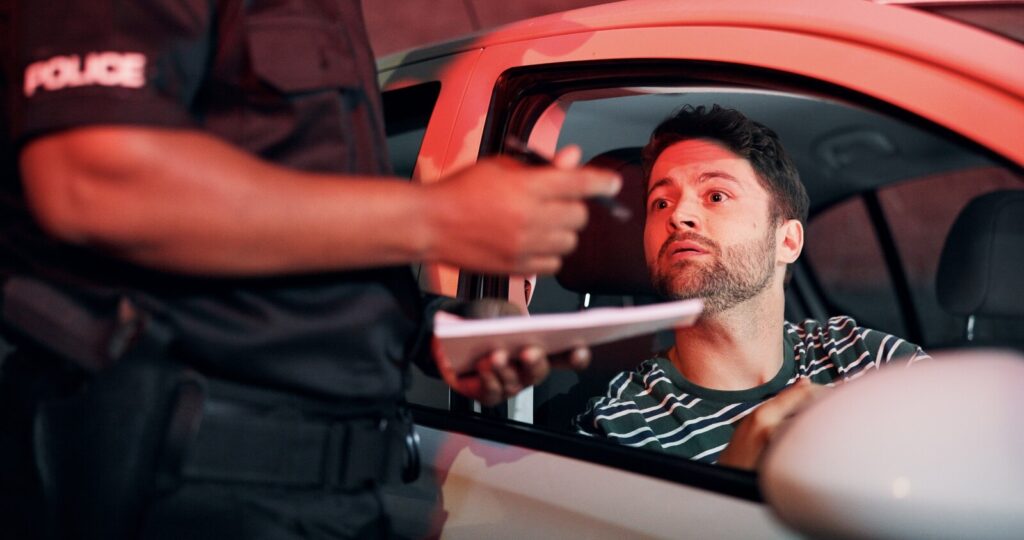 Police pull over man operating a vehicle under the influence